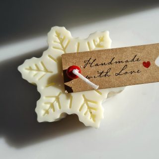 Copo de nieve de cera con aromas navideños